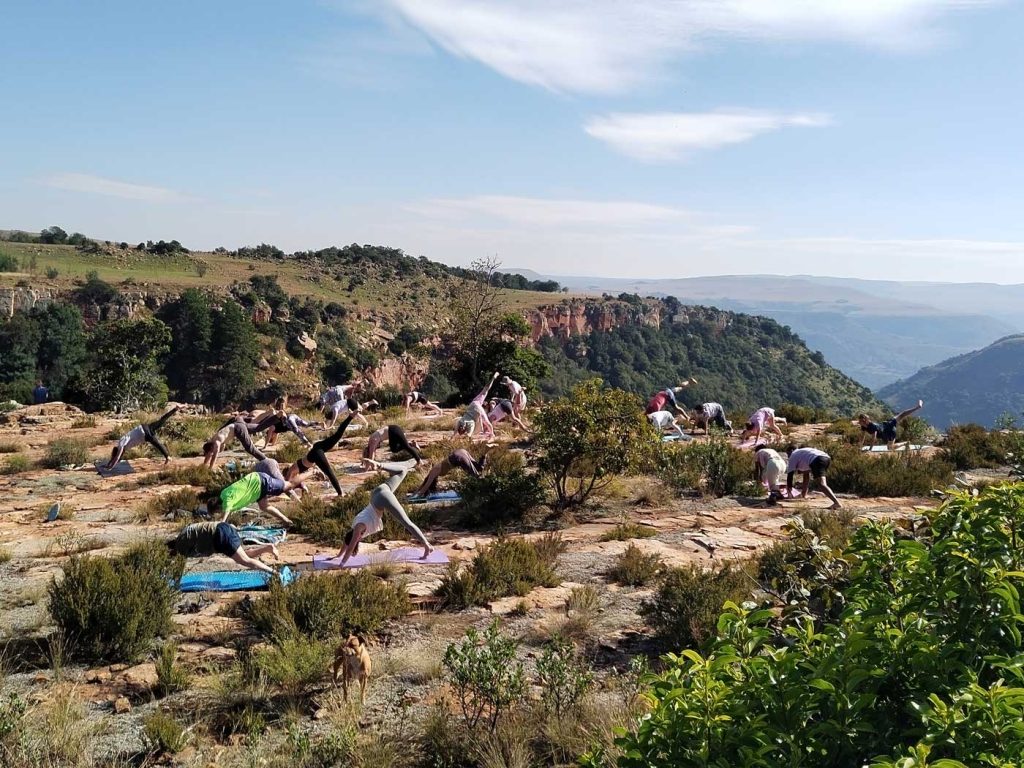 Joff leading a yoga class outdoors